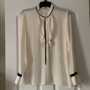 Cream ruffled blouse